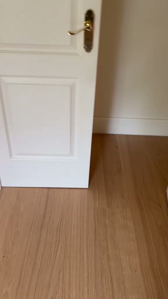 New wood-effect LVT click flooring through the hallway in Gullane